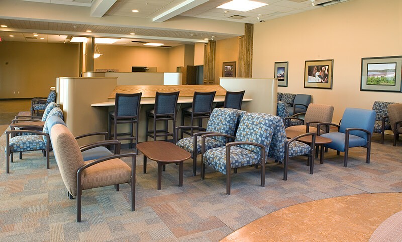 tables and chairs in a hospital common area