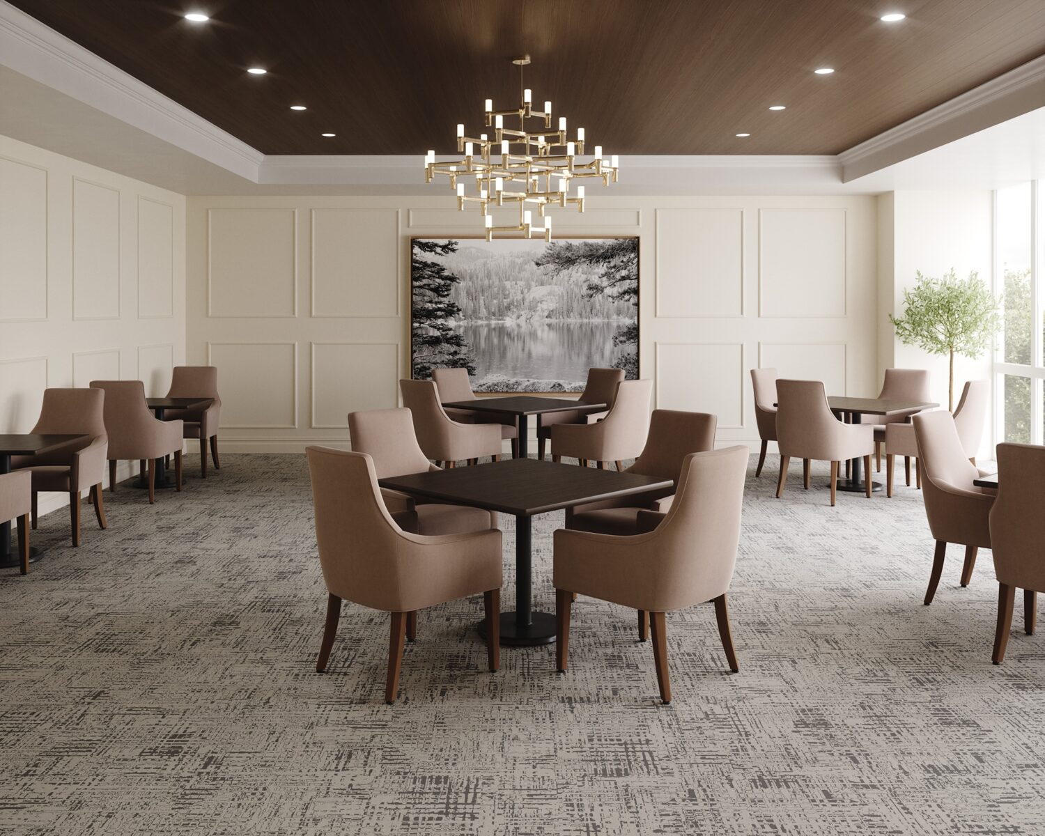 A dining room at a senior living facility, showing several tables surrounded by four beige chairs in a well lit room.